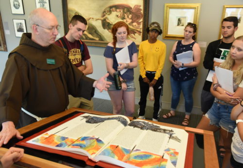 Siena College students view the Ezekiel illumination in The Saint John's Bible Heritage Edition