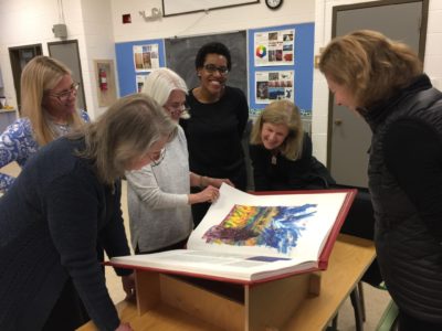 Docents and others viewing The Saint John's Bible Heritage Edition at St. Luke's Parish