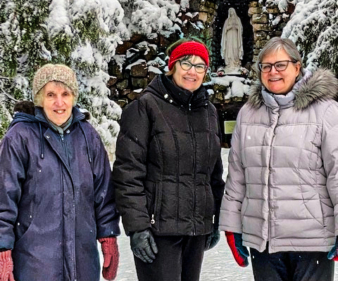 Sister Karen on a snowy walk with two other Sisters