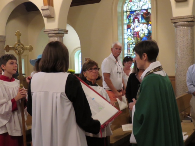 The Reverend Kate Wesch proclaiming the Gospel on the first Sunday the Heritage Edition was presented at St. John’s Episcopal Church