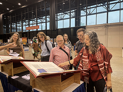 Conference attendees experience The Saint John’s Bible Heritage Edition. 