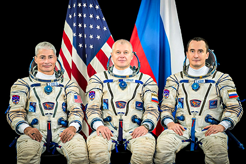 Photo Courtesy of NASA: Portrait of Expedition 65 Astronauts Mark Vande Hei (left), Oleg Novitskiy and Pyotr Dubrov. 