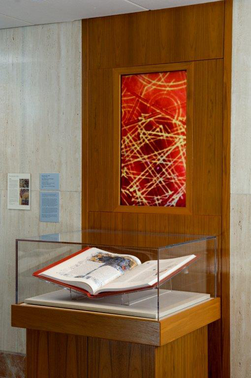 Photo: One volume of Mayo Clinic’s Heritage Edition lays open for patients, family members, hospital staff and others to view and reflect upon. 