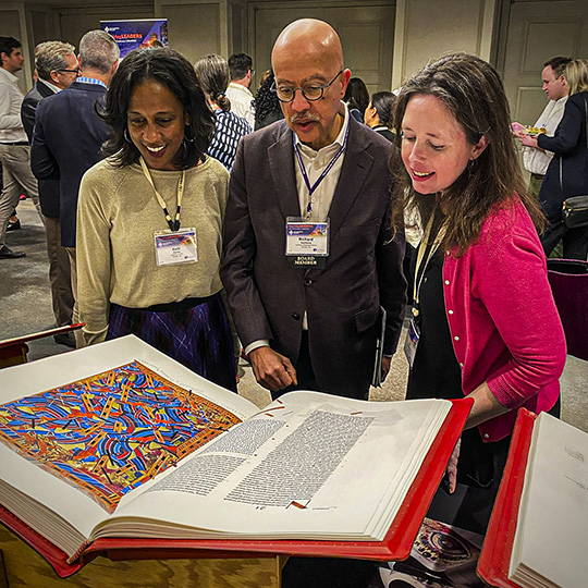 Attendees of the 2024 EPN Conference experience The Saint John's Bible Heritage Edition. 