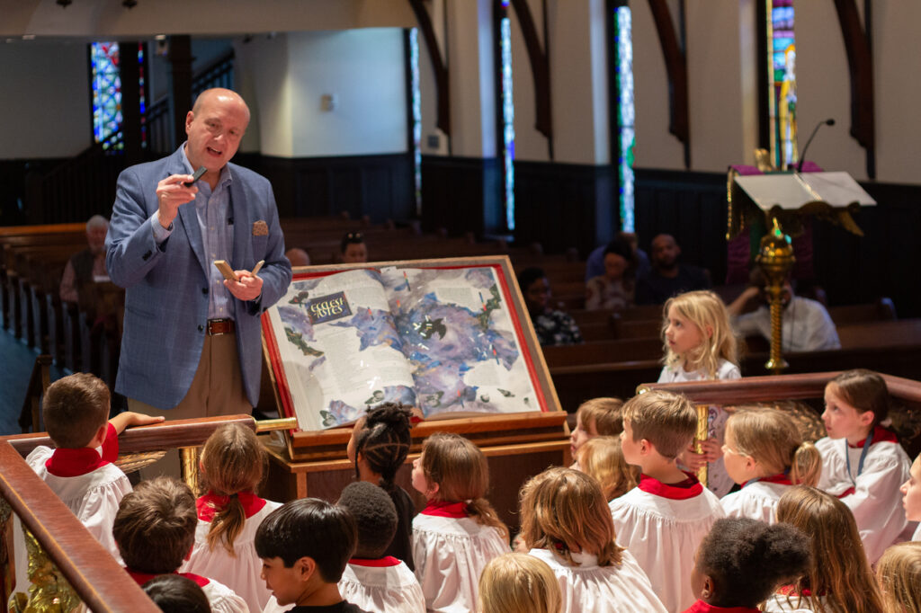 Tim Ternes, Director of The Saint John’s Bible at the Hill Museum & Manuscript Library at Saint John’s University, presents one illumination from the Heritage Edition to a group of young parishioners at St. John’s Episcopal Church.