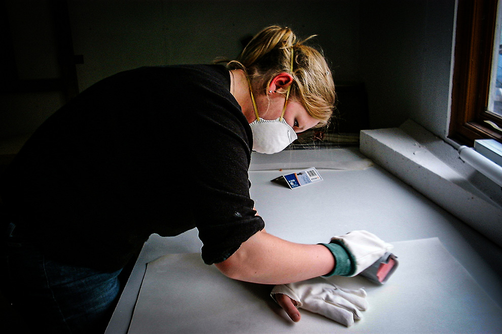 Harris prepares one sheet of vellum. 