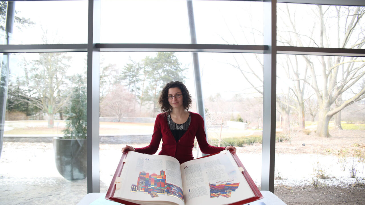 Bridget Ker, Coordinator of The Saint John’s Bible and Archives Technician for Bishop Farrell Library & Archives at the Roman Catholic Diocese of Hamilton